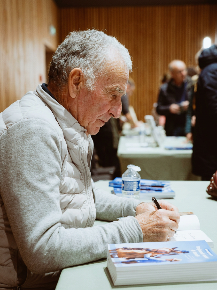 Michel Robert en dédicace au salon
